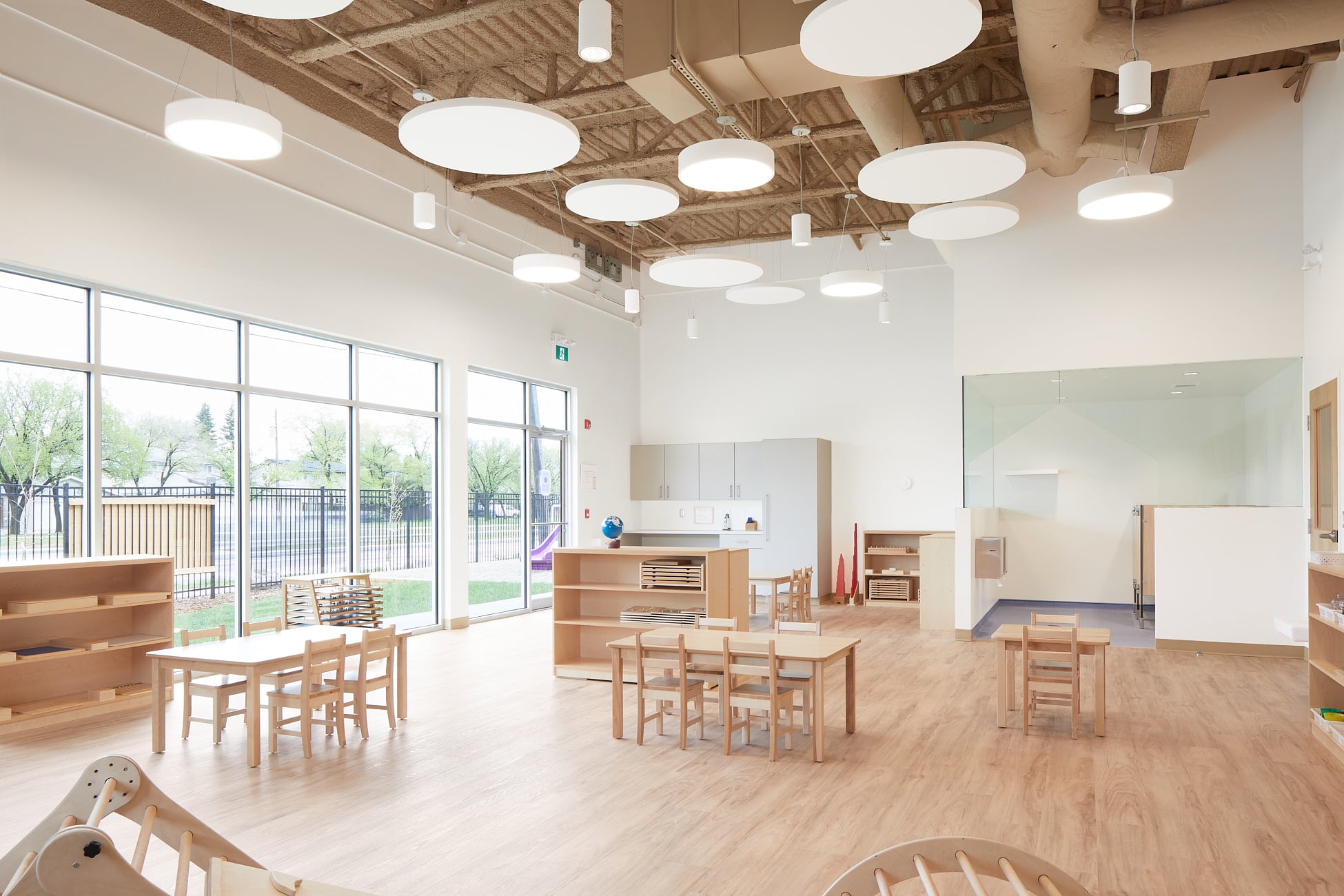 A wide, sunlit classroom